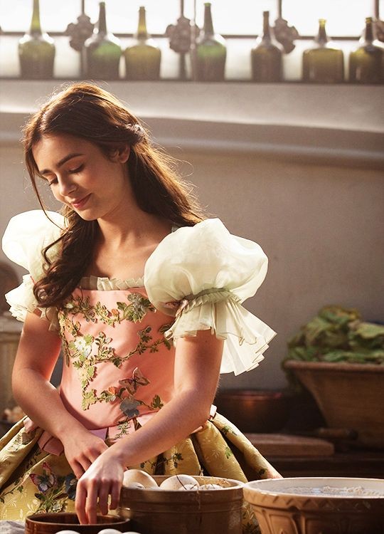 fuckyeahcostumedramas-lily-collins-in-mirror-mirror-snow-white-dresses-E0998ee1bdc6207cd8c69446c9249adf1