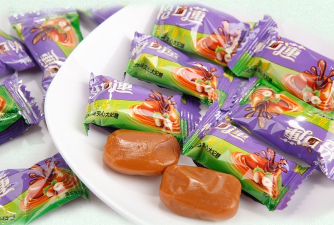 與英國「吉百利」的糖果是完全不同的食品，更堅稱自己在包裝與英國「怡口蓮」完全是不相似