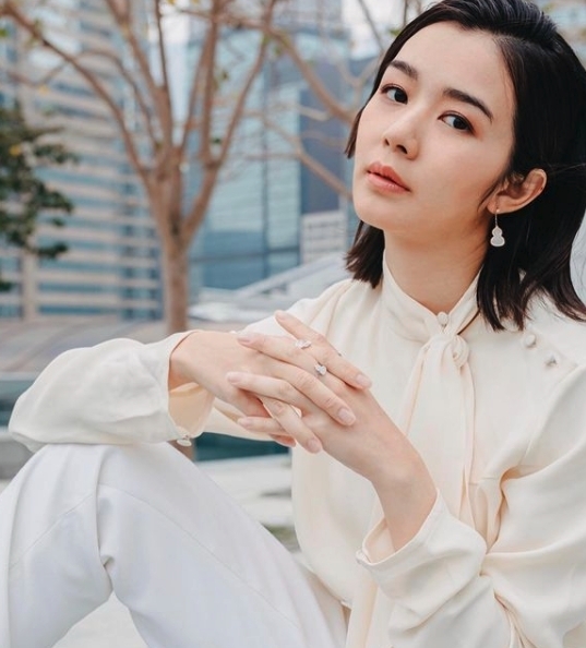 網民起初猜測他為女友裕美報名參選,反擊一直被揶揄不及舊愛「十優港姐」麥明詩的評論