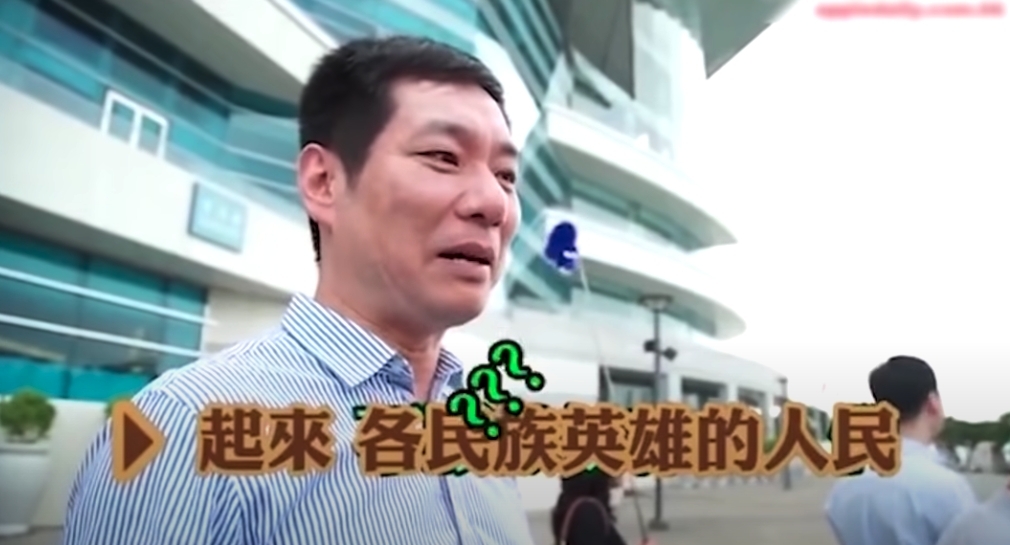 金紫荊廣場前的一個新聞片段,訪問了2位聲稱愛國的大陸旅客,無意卻發現不懂得唱國歌,其中一位更亂改歌詞唱出:「起來!各民族英雄的人民」