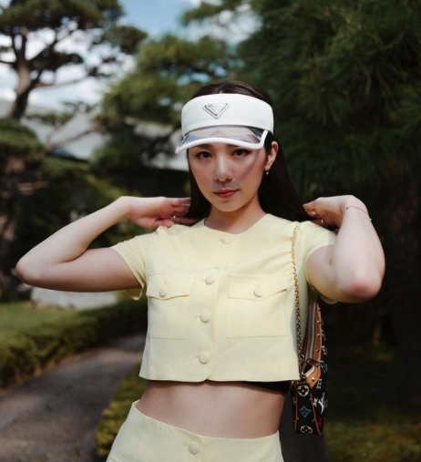 Heidi也十分喜歡把名牌混搭運動服裝