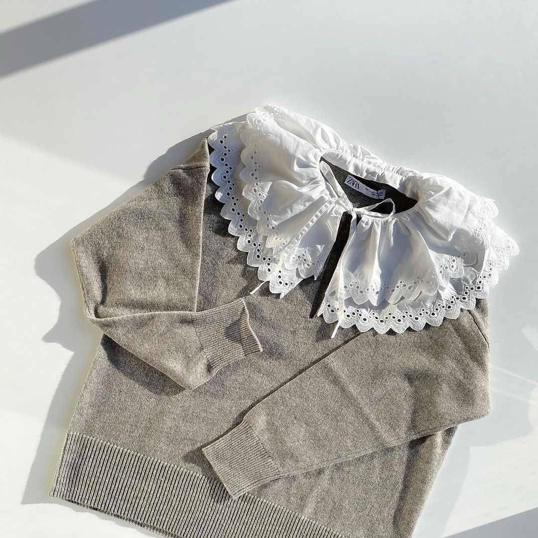 ZARA 最近還有一款單品受到時尚界的青睞,以灰白色為主調設計