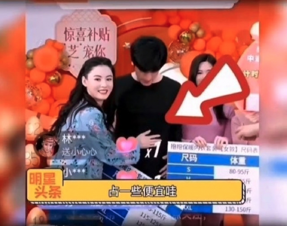眼看高大威猛的男模特兒,就連張栢芝都忍不住伸手撫摸對方的腹肌!