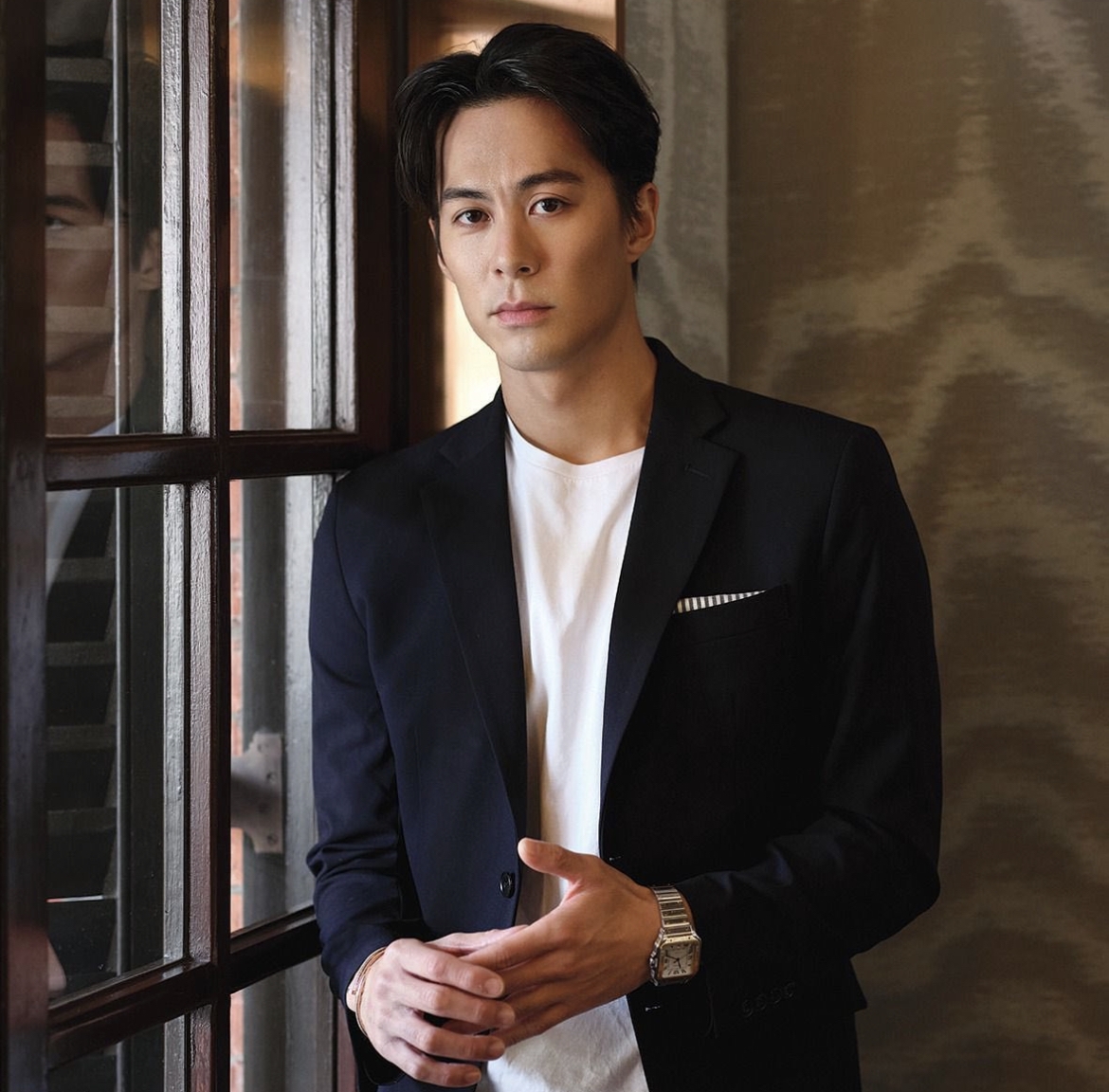原來他早於14歲已經是香港游泳代表隊成員,自小操練一身強健的肌肉