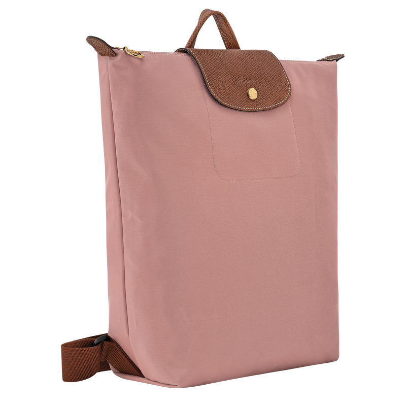 Longchamp背囊選色可先從黑色、海軍藍、灰調等百搭中性色入手，想要更柔和可選米白或奶茶色，若想增加造型感則可考慮粉茶色或開心果綠等季節色。