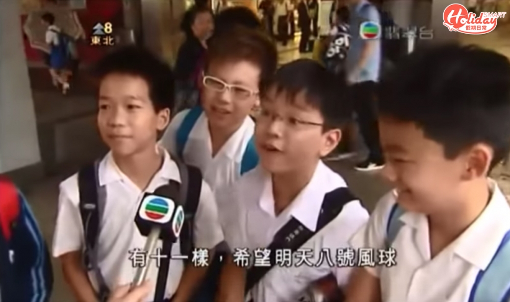 時掛8號風球,學校提早放學,有小學生接受訪問時表現興奮