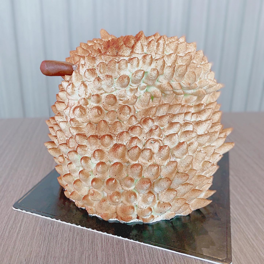 3D貓山王榴槤蛋糕用上馬來西亞頂級榴槤,果肉柔軟綿密,甜而不膩。
