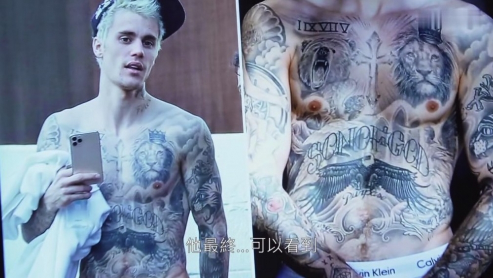 Justin Bieber身上嘅紋身圖案令主持人認為佢出道前就已經加入光明會!
