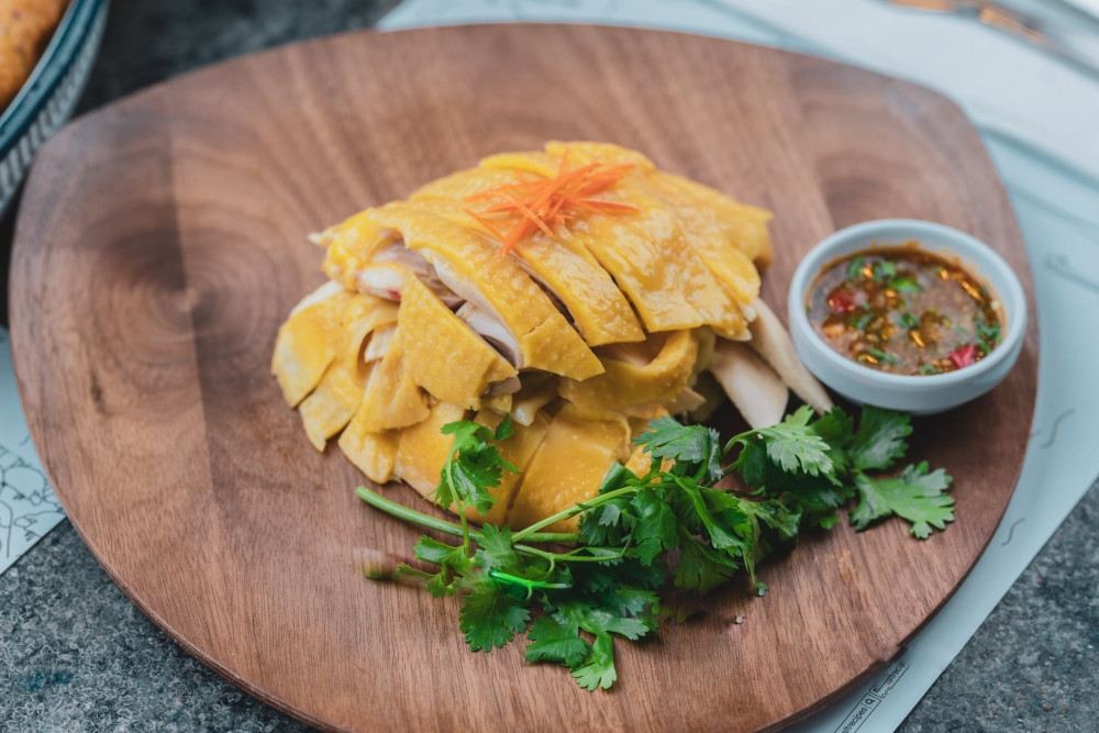 水門雞飯開業多年,主打供應正宗泰式雞飯,更找來泰國大廚坐鎮炮製地道泰式海南雞。