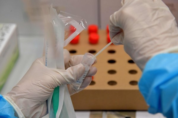 政府確定暫緩全民強制檢測計劃。