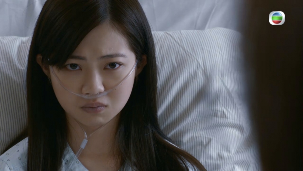 區明妙飾演嘅重病患者，無助及絕望眼神成功打動觀眾嘅心