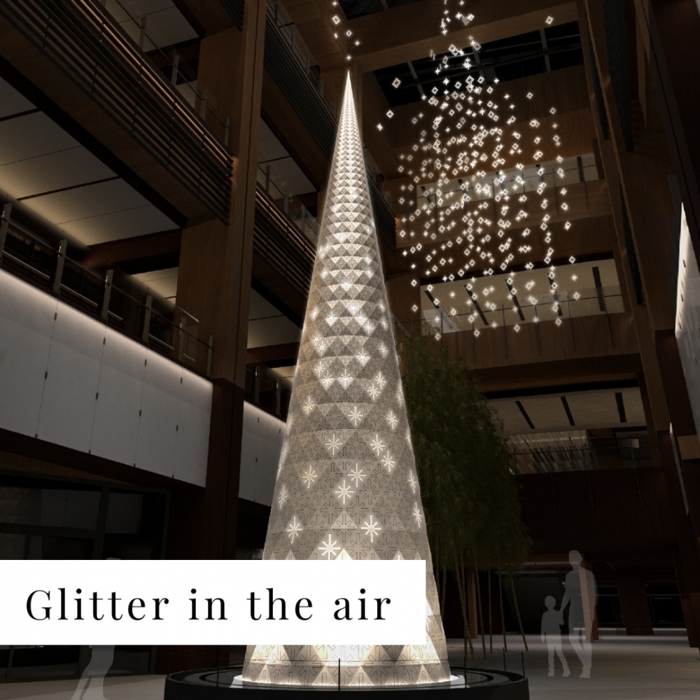 巨大雪花造型的銀白色聖誕樹以及掛在商場上空的雪花吊飾「Glitter in the air」