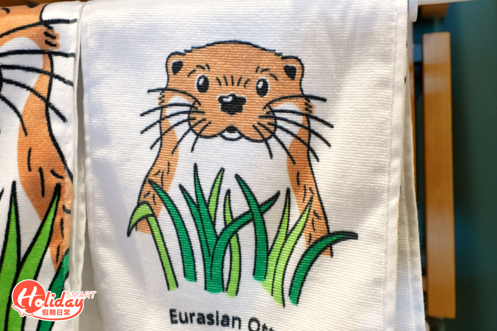 印有水獺圖案的毛巾。