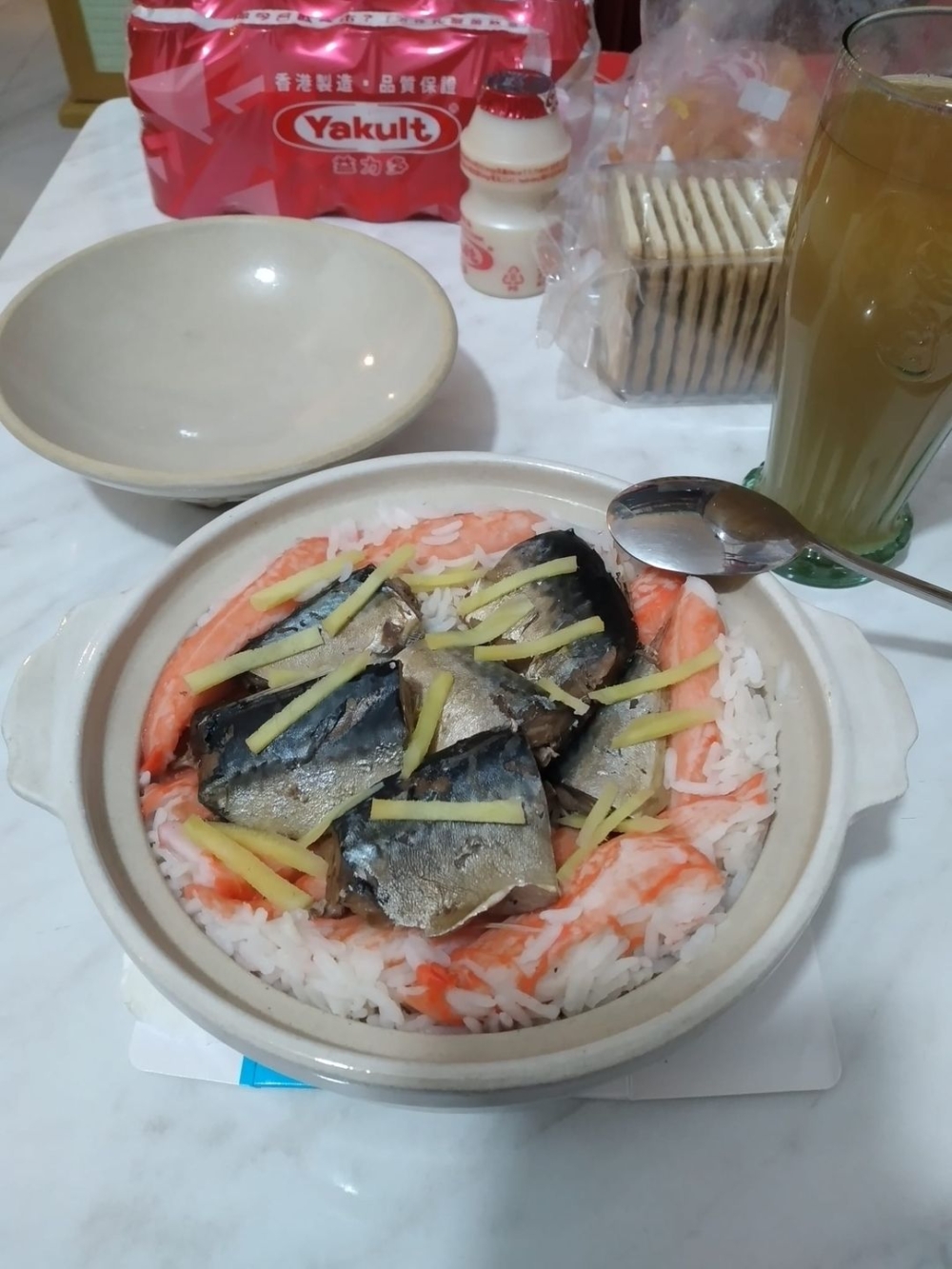 松葉蟹味腿鯖魚黃薑煲仔飯