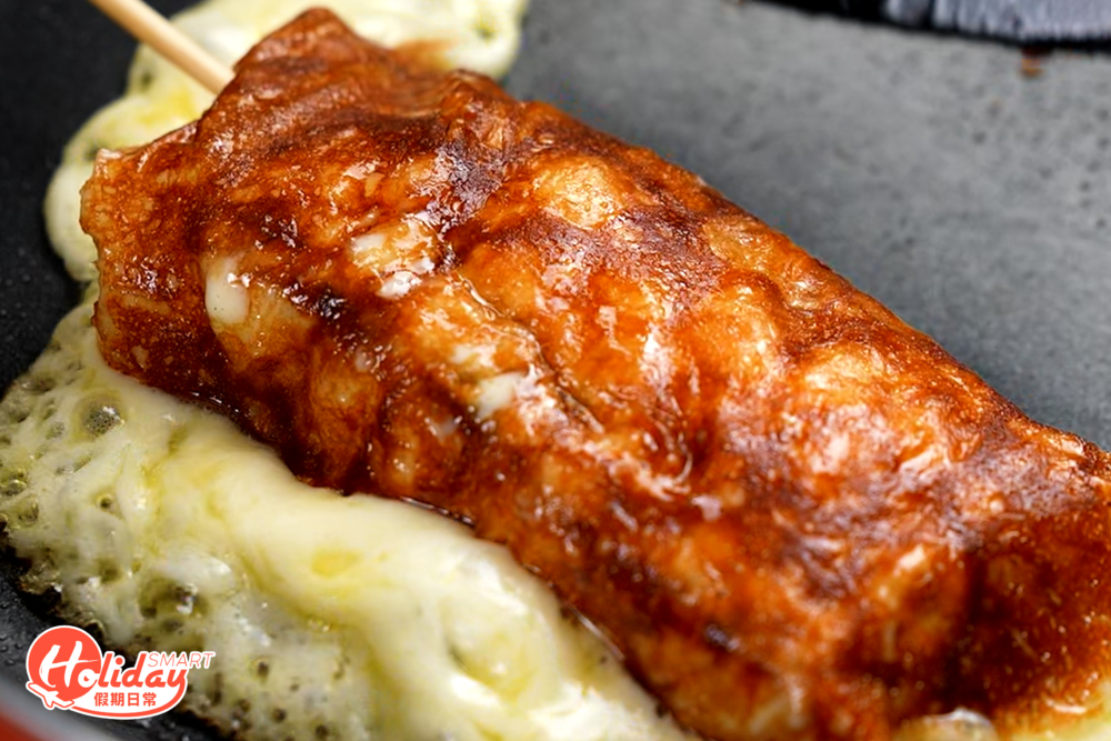 並且底部變得焦脆，就能完美地裹在糕串外層。