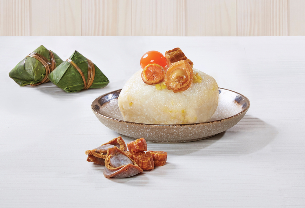 原隻鮑魚瑤柱豚肉裹蒸糭。