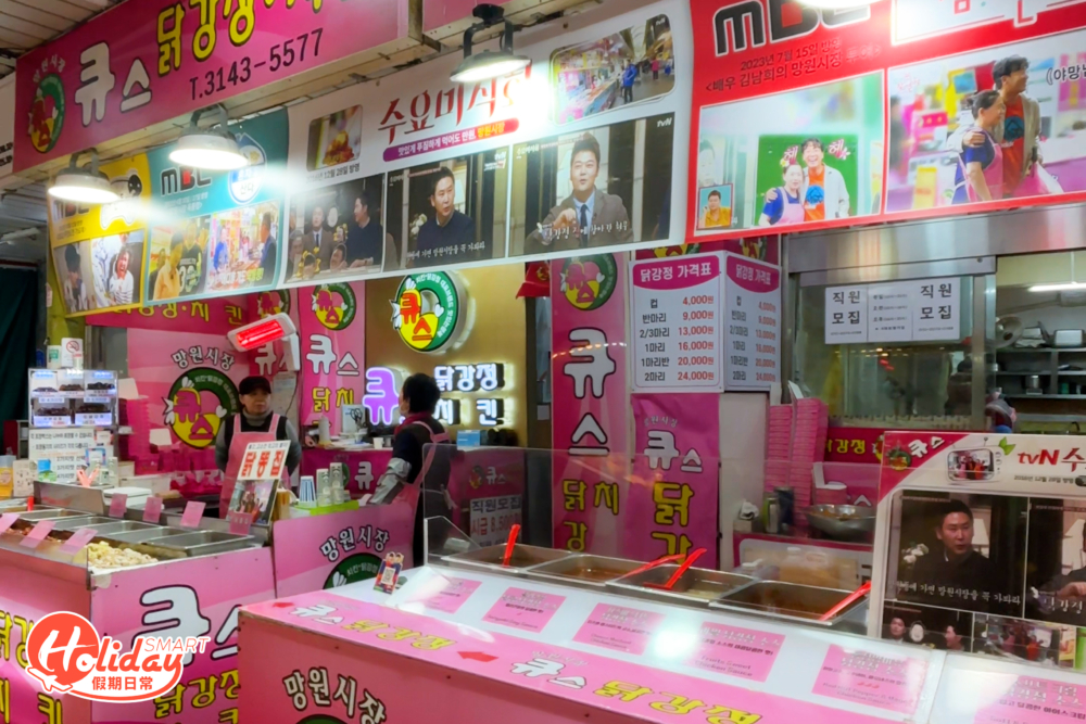 QS炸雞店面,外觀全粉紅色。