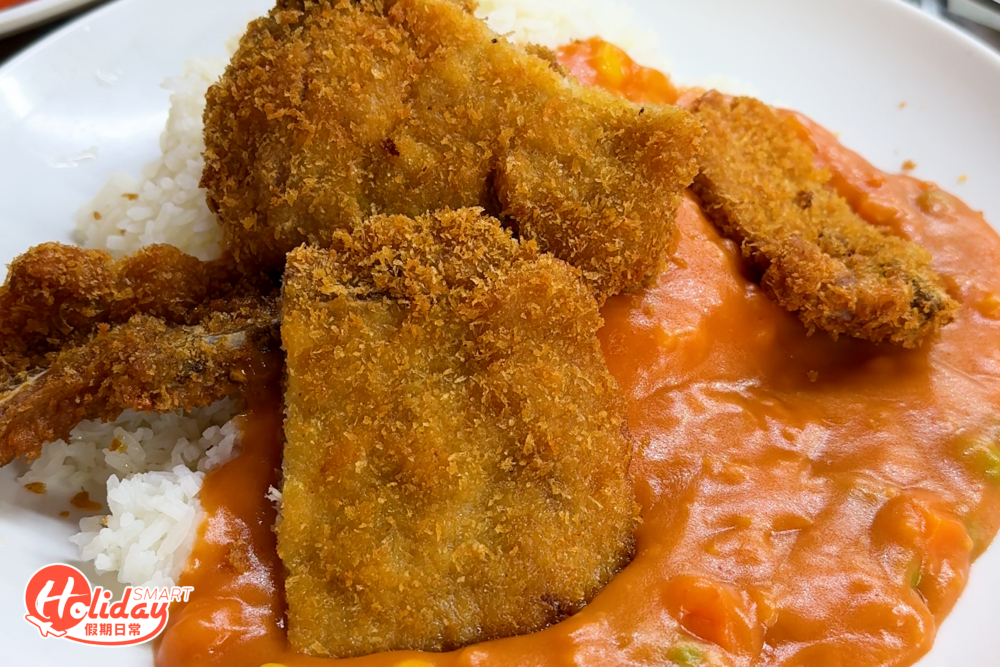 燴茄汁吉列豬扒飯，醬汁香甜得來，帶濃郁茄香味。