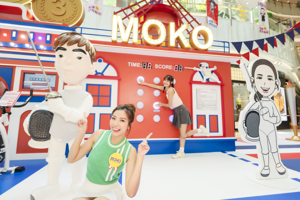 MOKO新世紀廣場聯同本地插畫家Cuson,將運動融合本土藝術的大型裝置,設有互動遊戲及11位運動員打卡位,讓全民多角度投身體育競賽的熱血和拼搏!