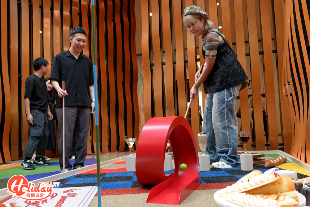 今年的市集結合體育元素，現場有迷你高爾夫球體驗，球場分別設計成迷你版鰂魚涌和太古坊社區。