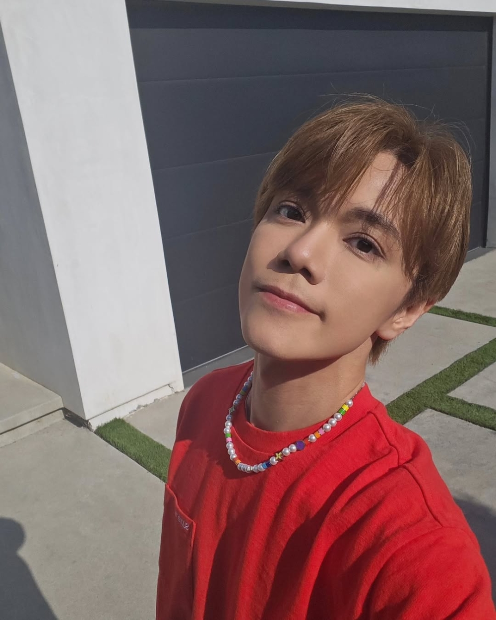 屬猴藝人代表：張敬軒。