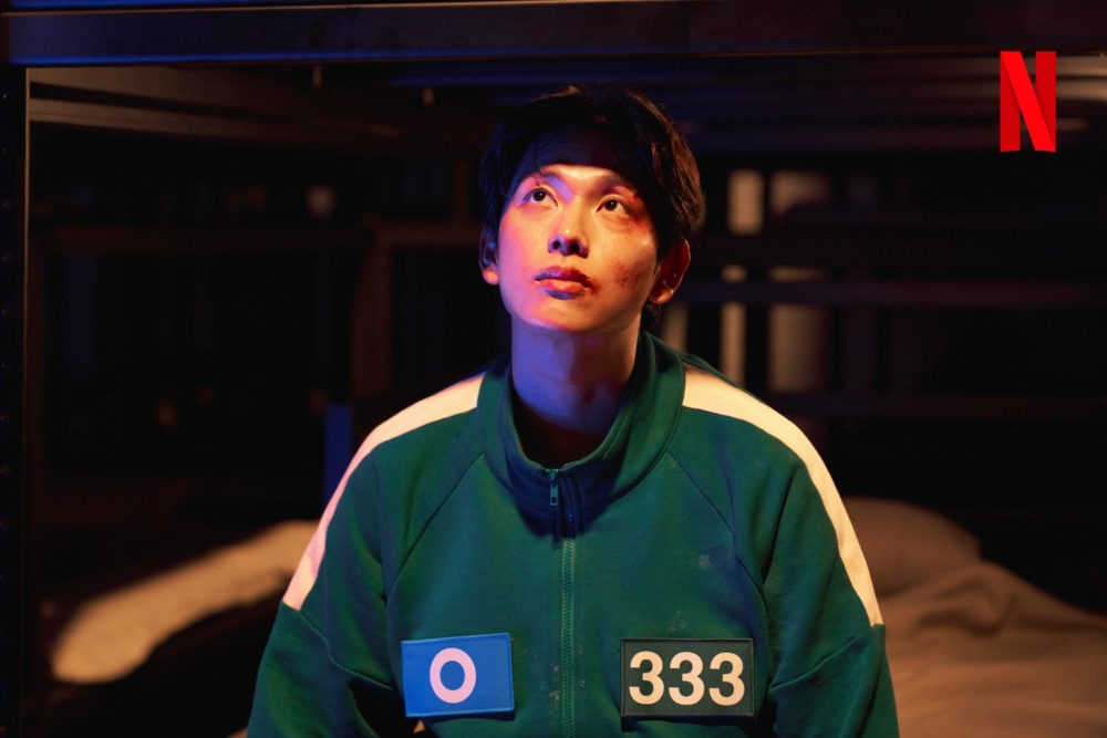 任時完飾演玩家「333號」李名器。