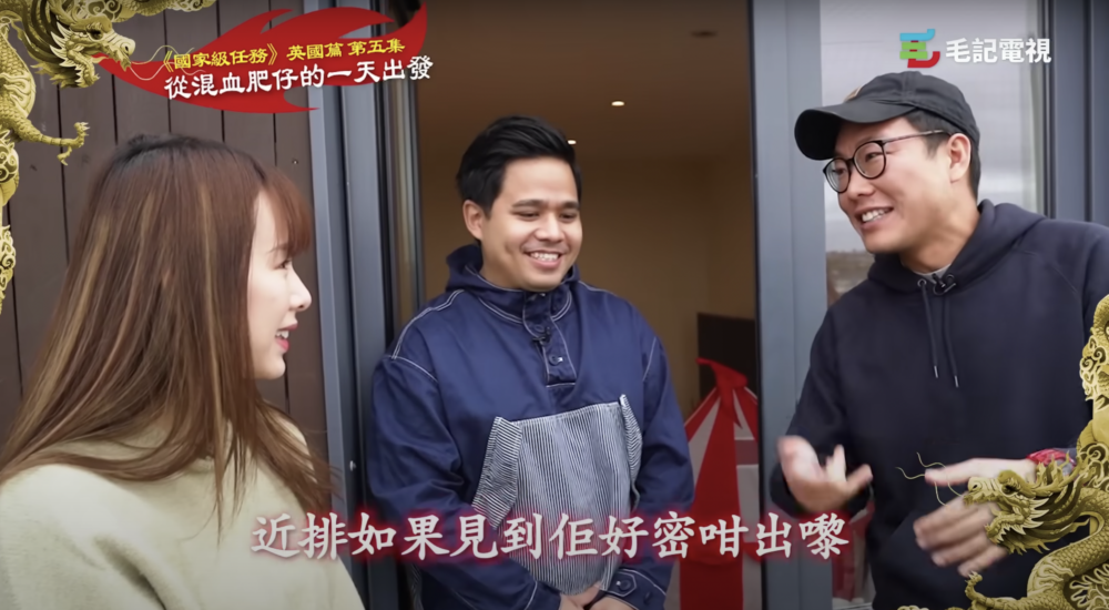 混血肥仔隨即尷尬苦笑