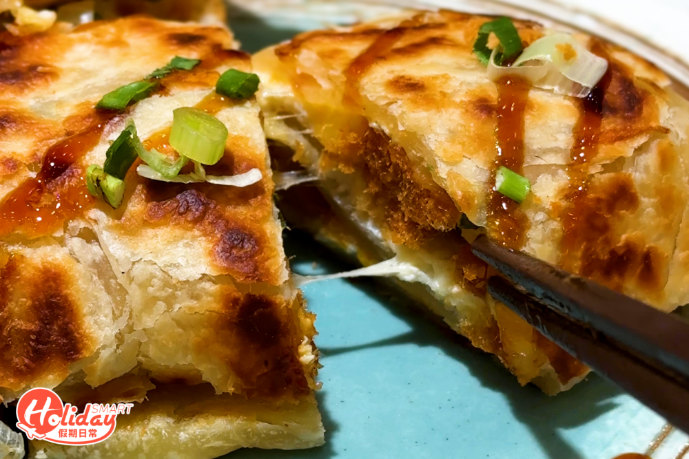 拉絲的酥皮蛋餅