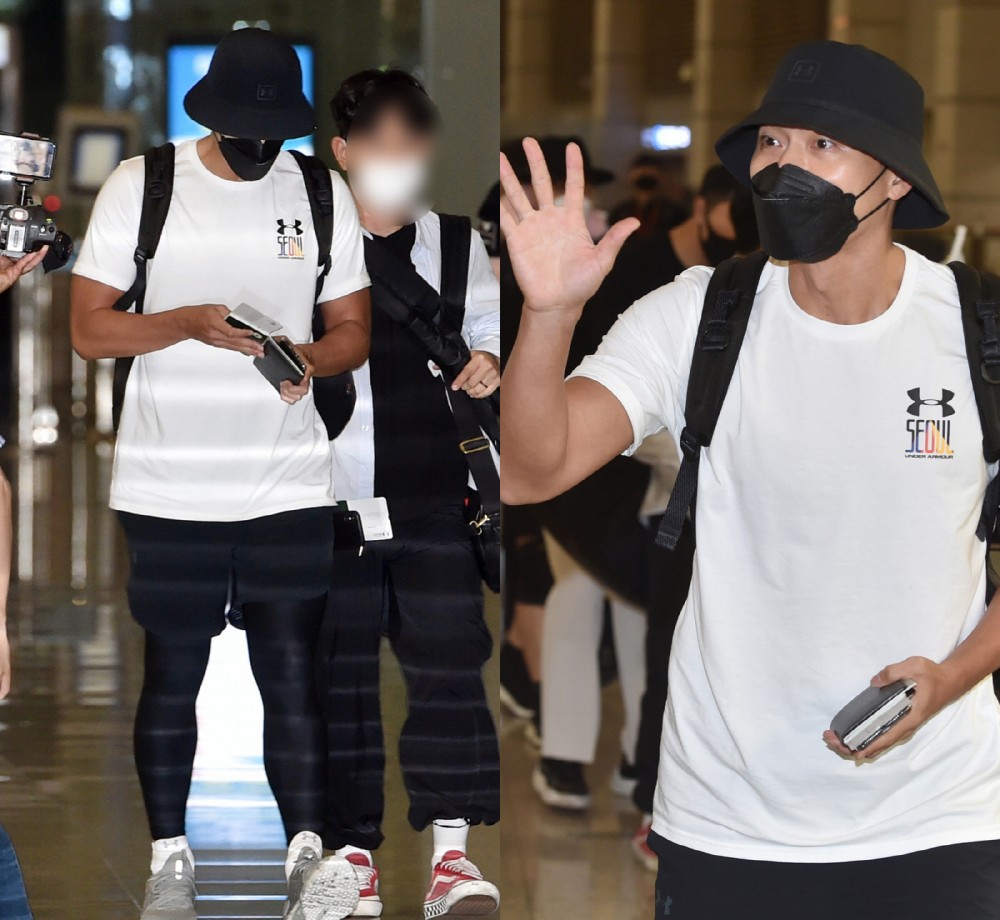 玄彬穿著黑白色系輕便服裝出國