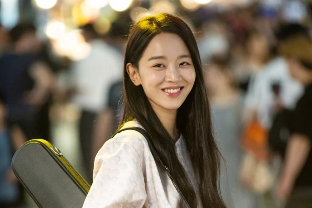 申惠善飾演著名攝影師「趙三達」