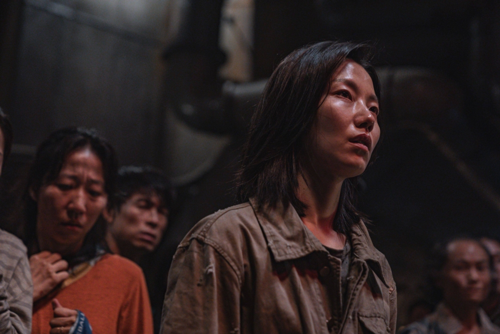 金信祿飾演倖存者們的領導者