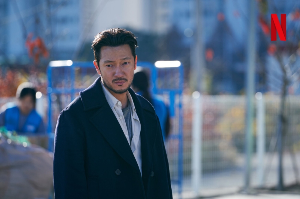 孫錫久飾演的是追捕李唐殺人案的刑警「張難勘」