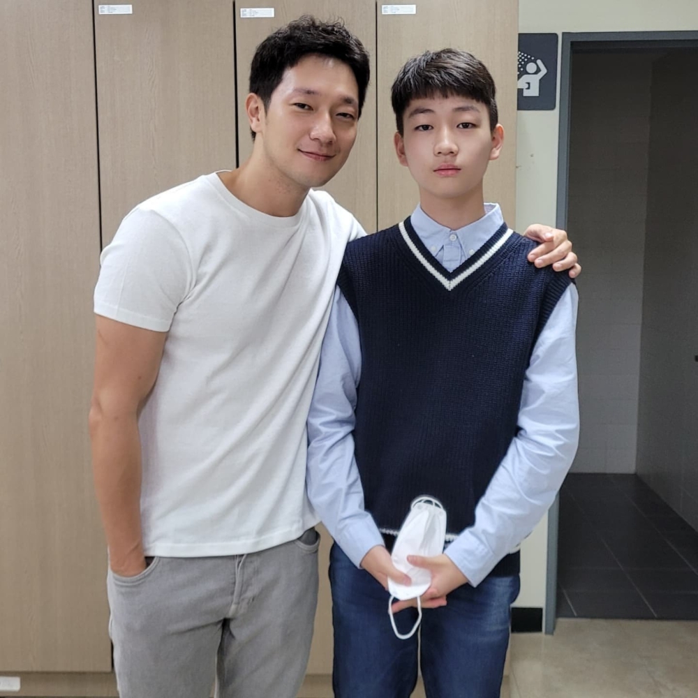 孫錫久與童星的合照