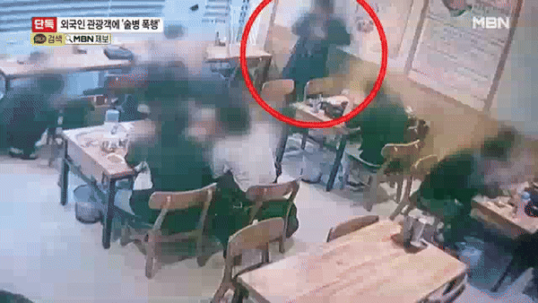 韓男手持酒瓶尾隨台灣觀光客