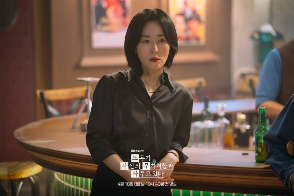 姜末今飾演電影公司代表兼慶世的妻子「高惠珍」