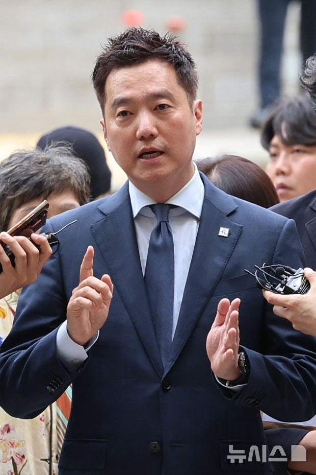 金世義否認罪行