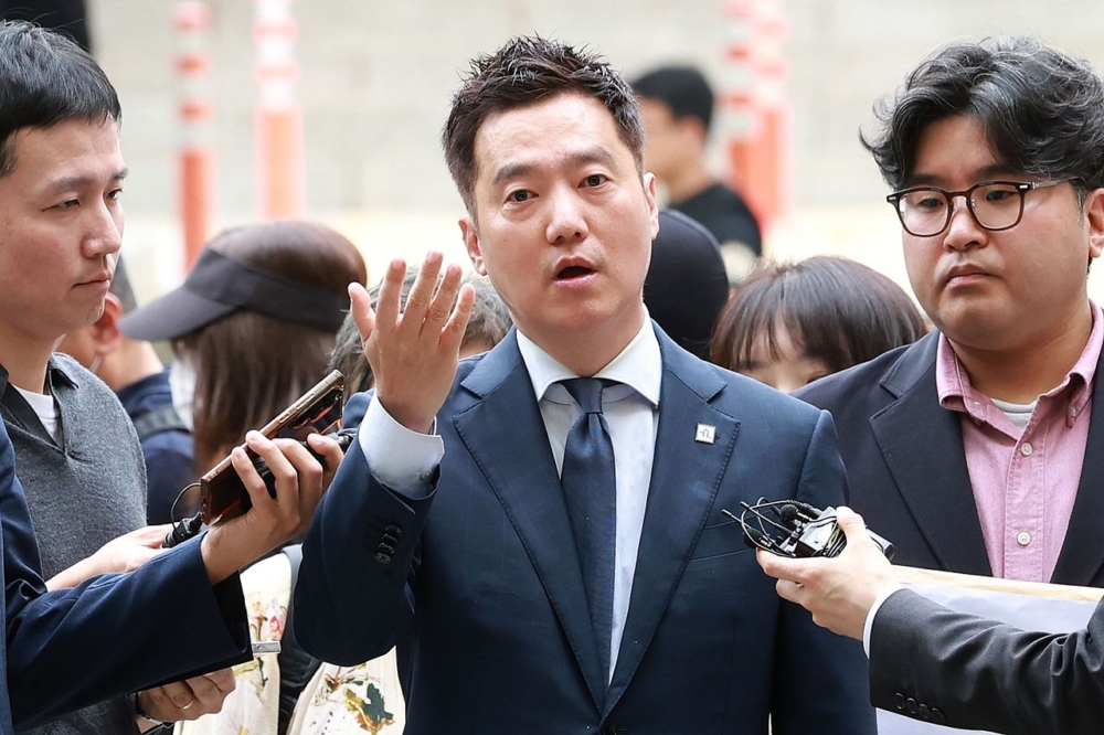 金世義因涉嫌捏造證據而被拘留